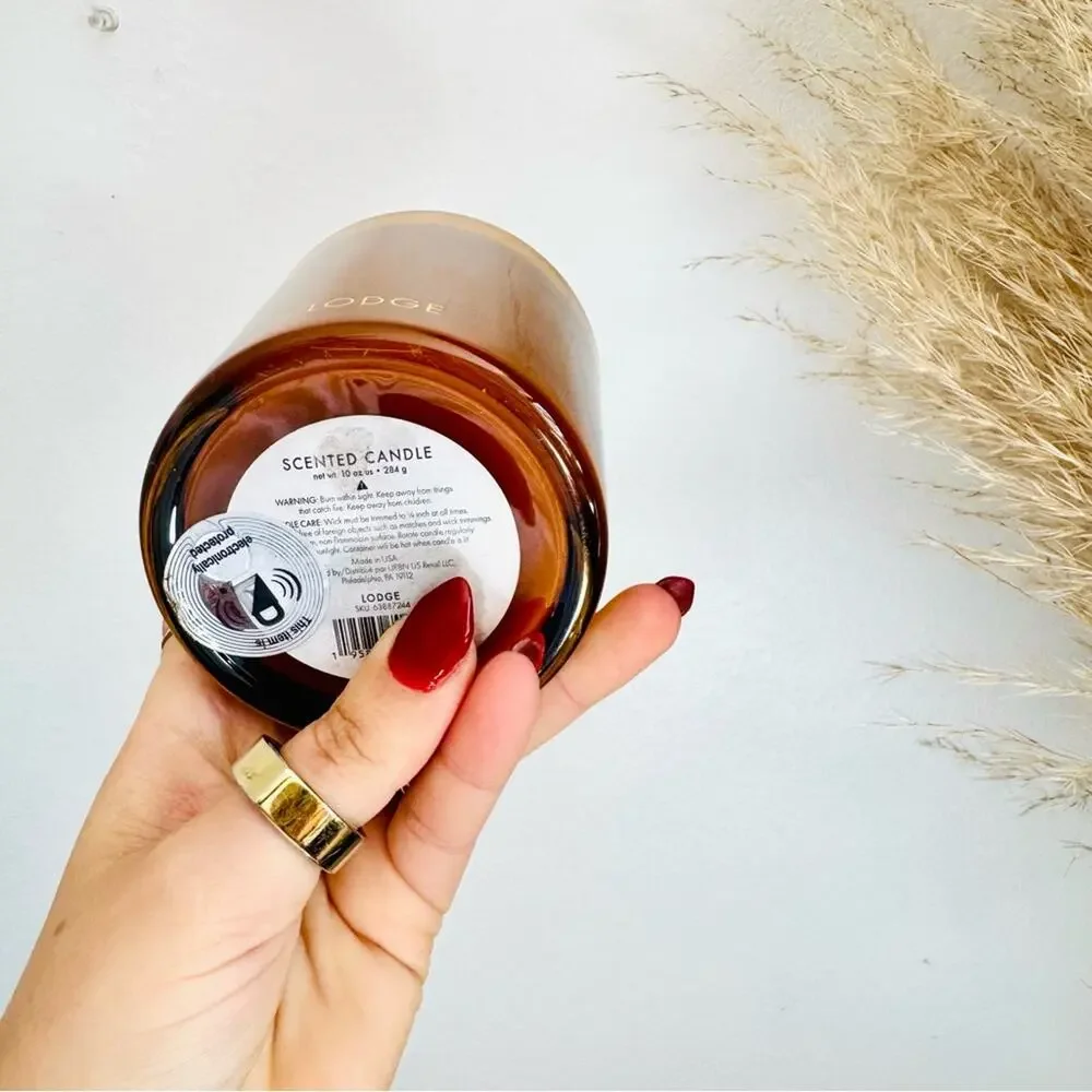 NEW FP FREE PEOPLE Amber Rust Glass Vessel Lodge Palo Santo $48 Scented Candle